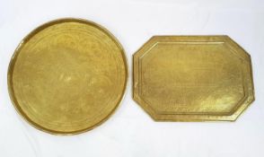 2 LARGE VINTAGE BRASS SERVING TRAYS, WOULD MAKE NICE TABLES. ONE CIRCULAR WITH A 60CM DIAMETER,