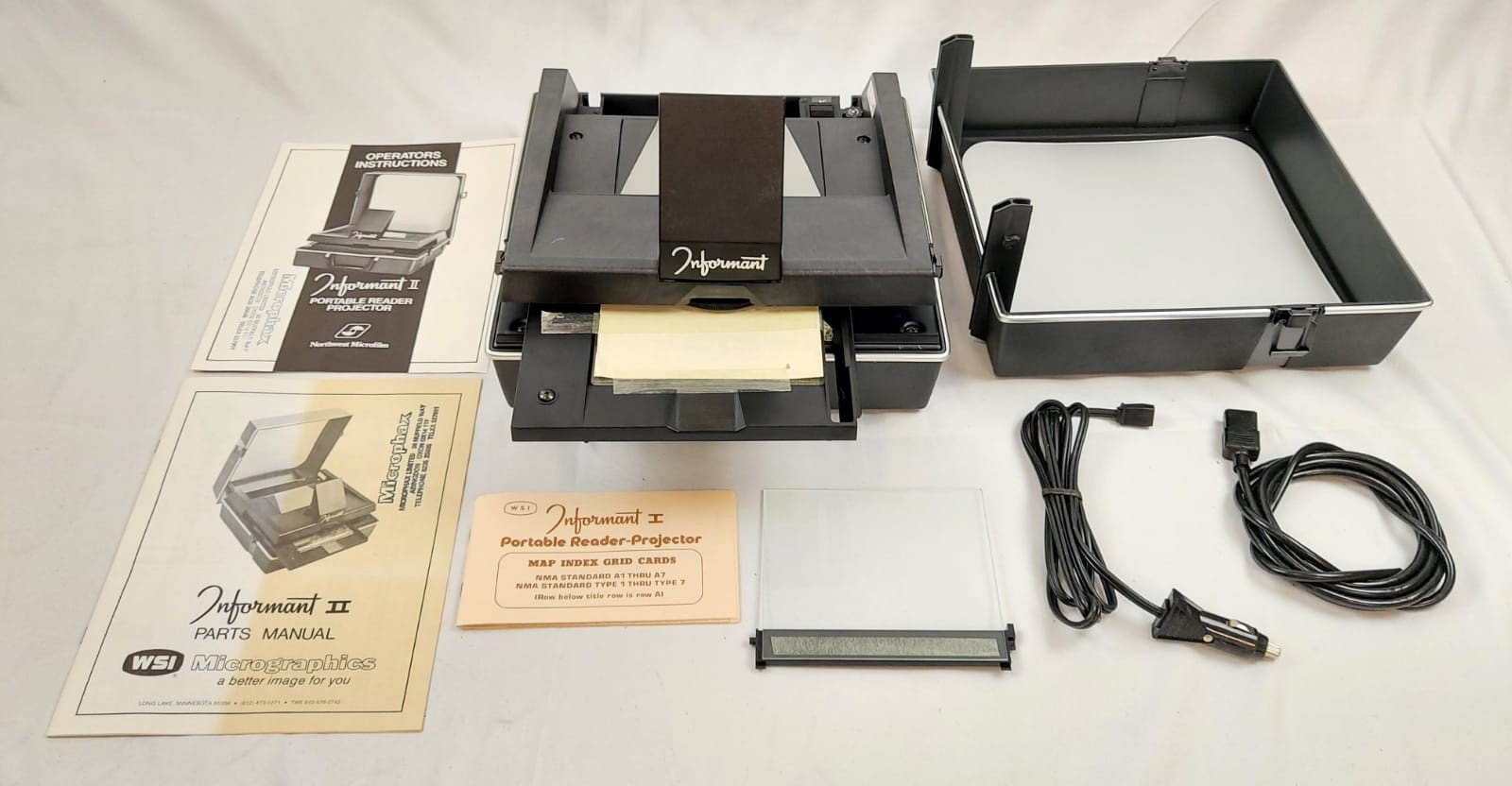 A Vintage Informant I - Portable Reader Projector for Microform/Microfiche. Comes in portable