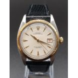 A Rare Vintage Rolex Perpetual Ovettone Gents Watch. Lizard skin strap. 18K gold bezel and winding