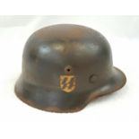 WW2 German M40 Helmet & Liner with hand painted SS Decal. A lot of SS Helmets were re-furbished