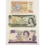 Three Vintage Uncirculated Banknotes - Canada. New Zealand and Suriname.