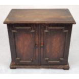 A delightful Antique small Wooden Cabinet. Double doors with three interior levels. 33 x 32cm