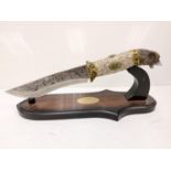 Elaborate repro Native American presentation dagger with a wolf's head handle. Intricately