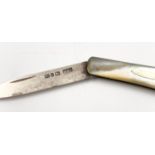 An Antique Fruit Knife - Hallmarked 1888 Hilliard and Thomason of Birmingham. Mother of Pear