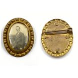 An Antique Brooch with Photograph. 4cm