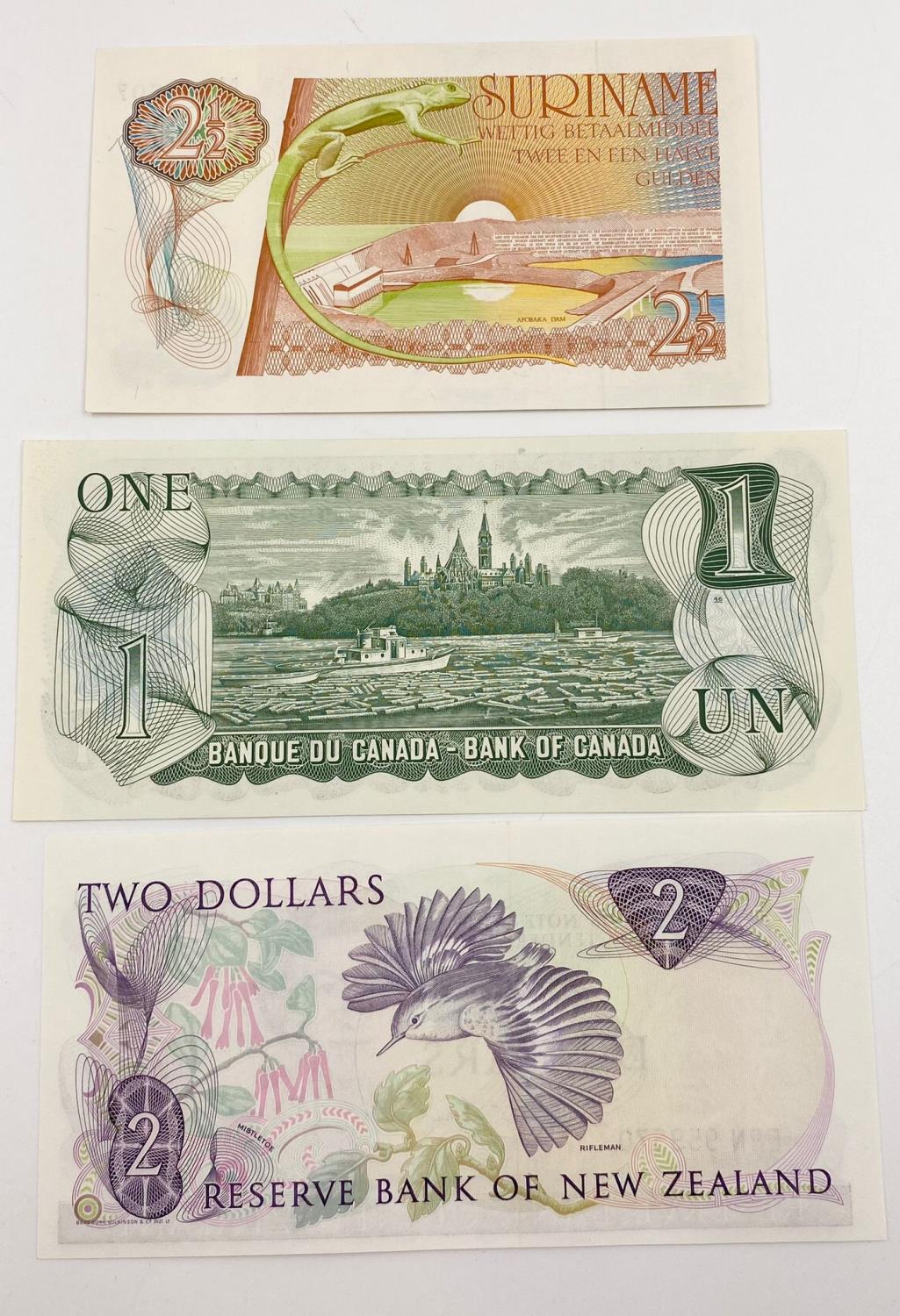 Three Vintage Uncirculated Banknotes - Canada. New Zealand and Suriname. - Image 3 of 3