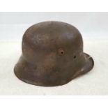 WW1 Imperial German Machine Gunners Helmet. Remains of insignia from the 9th Machine Gun Kompanie.