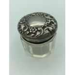 ANTIQUE SILVER ROUGE POT , having silver repousse top over a 10 sided glass pot..Clear hallmark