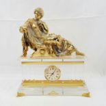 AN IMPOSSING LARGE MANTLE CLOCK, WITH RECLINING ROMAN FIGURE. IN A REPRODUCTION ORMALU STYLE.