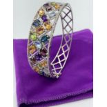 Silver multi gemstone bracelet/bangle having amethyst,aqua,peridot,topaz, etc set in silver