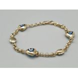 A 14k Yellow Gold Evil-Eye Bracelet. 15cm. 4g