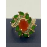 9 carat GOLD COCKTAIL RING in art nouveau style having green tourmaline and Aqua surround with