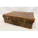 A Distressed W.H. Whisson Leather Antique Suitcase with Star of David-esque Marks on the Buckles. 48