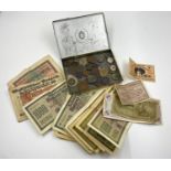 A TIN OF VARIOUS GERMAN NOTES AND COINS