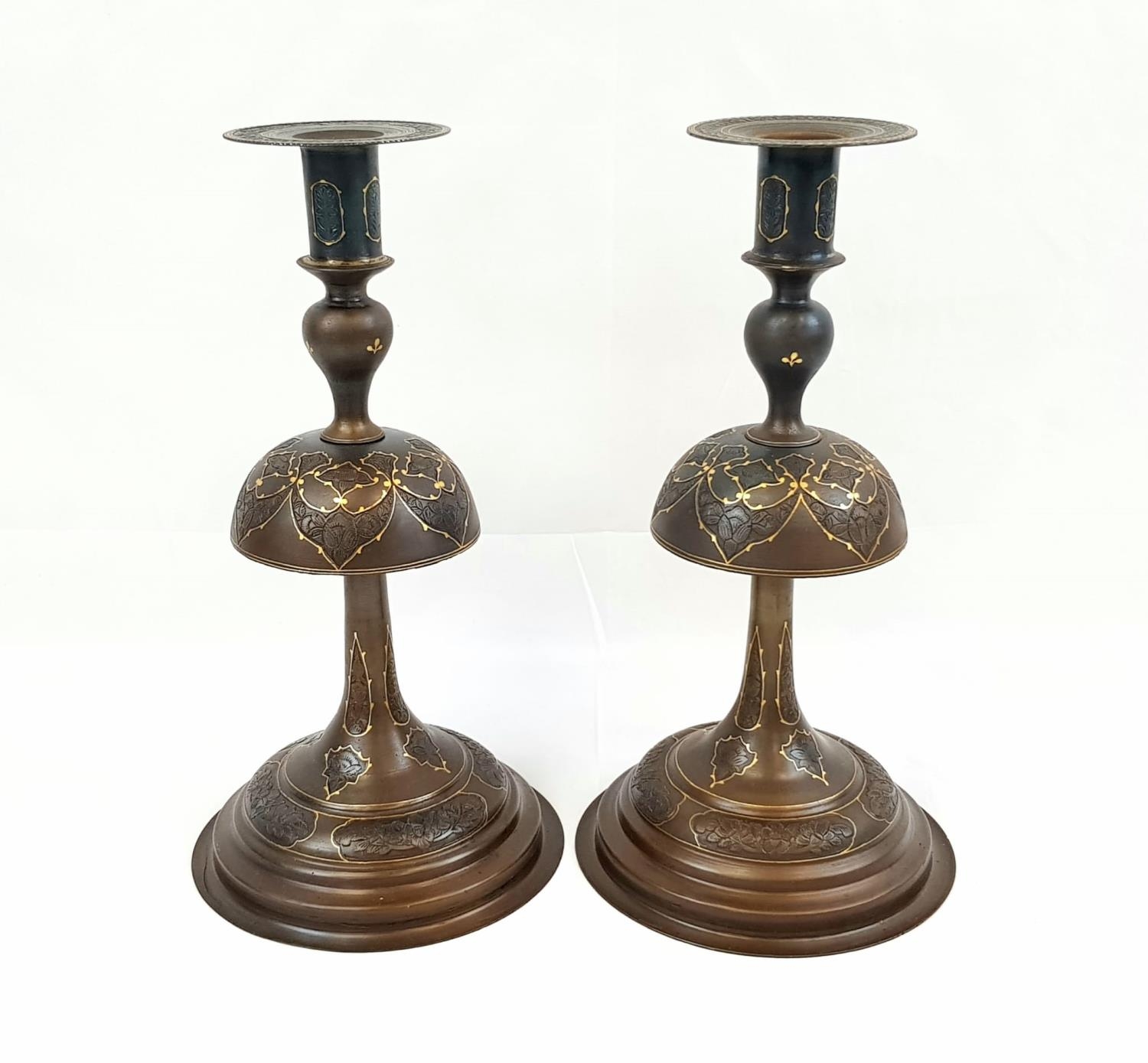 UNUSUAL PAIR OF STILL CANDLESTICKS WITH GOLD INLAY THOUGHT TO BE OF PERSIAN ORIGIN, STANDING 35 CM