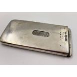 A SOLID SILVER CARD CASE HALLMARKED LONDON 1907 MADE BY HENRY WILLIAMS. 45.8gms 8 x 4cms