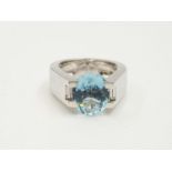 A CARTIER 18K WHITE GOLD RING WITH LARGE AQUAMARINE. 20.6gms size N