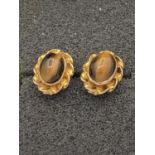 Pair of 9 carat gold Tigers eye earrings.1.6 grams.