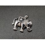 An 18k White Gold Floating Diamond Set Elephant Pendant. 4.85g.