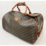 A Large Canvas Monogrammed Canvas Bag in a Louis Vuitton Style. Note! This is not a Louis Vuitton