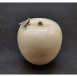 A Solid Silver House-Fly Resting on a White Hardstone Apple Paperweight. An extraordinary piece. 6 x
