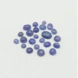 43.80CTS NATURAL TANZANITE, OVAL CABOCHON. COMES WITH GLI CERTIFICATION