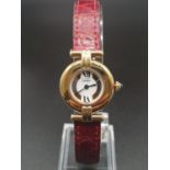 A ladies 9ct Cartier Vermil quartz watch, with tricolour design on dial, comes with original