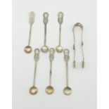 An Early Ottoman Islamic Solid Silver Set of Six Spoons and a Pair of Sugar Nips. Decorated with