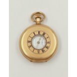 Half hunter pocket watch, in gold metal, roman numerals to front case.