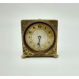An Early French Travel Alarm Clock - Patented. In a rockery pattern. 5 x 5cm. In working order.