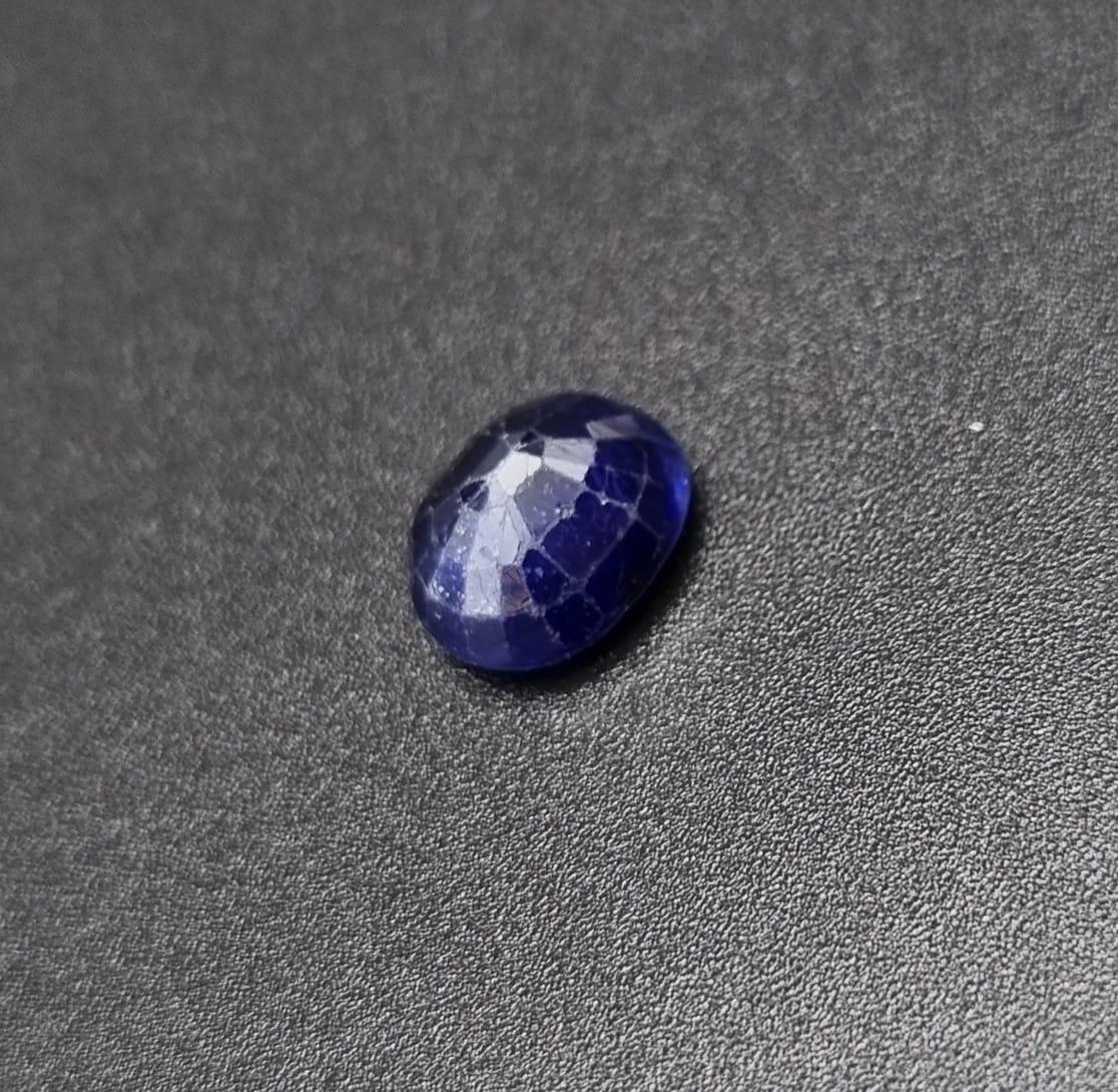 4.14CTS NATURAL BLUE SAPPHIRE, OVAL MIXED CUT. COMES WITH IGLI CERTIFICATE.