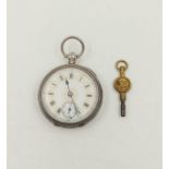 Vintage silver pocket watch with second hand dial, mechanical movement, comes with key, markings