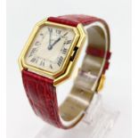 AN 18K GOLD CARTIER OCTAGONAL TANK STYLE WATCH WITH ORIGINAL CARTIER LEATHER AND GOLD STRAP . 27 X