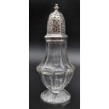 A Cut Glass Sugar-Shaker with Silver Top Cover. Chester hallmark. 17cm tall.