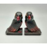 A Pair of Early Carved wooden Love Bird Bookends with Cherry-Amber Beaks and Feet. 9 x 13.5cm