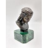 A French Bronze Bust on a Malachite Base. Signed by the sculptor. 15.5cm tall.