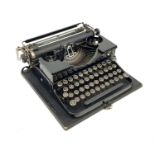 A Vintage (1930s) Royal Portable Typewriter. In good condition but A/F. In case - 32 x30cm.