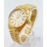 AN 18K GOLD LADIES ROLEX OYSTER PERPETUAL DATEJUST WITH ATTRACTIVE WHITE FACE AND SOLID GOLD