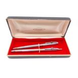A BANKERS PEN SET IN ORIGINAL CASE, MADE IN THE USA RANGE WITH GOS WROTE ON THE EMBLEM.