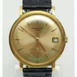 A VINTAGE 18K GOLD PATEK PHILIPPE GENTLEMANS WRIST WATCH ON LEATHER STRAP. 35mm