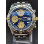 A Breitling Chronograph Gents Watch. Stainless steel strap and case - 40mm. Blue dial with