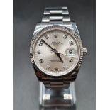 A ROLEX OYSTER PERPETUAL DATE IN WHITE GOLD AND STAINLESS STEEL WITH SILVERTONE FACE AND 5 DIAMOND