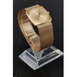 AN 18K GOLD PATEK PHILIPPE WATCH WITH SQUARE LOOK AND SOLID GOLD STRAP. 28 x 28mm