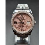 A ROLEX OYSTER PERPETUAL DATEJUST WITH UNUSUAL PINK FLORAL PATTERNED FACE AND ORIGINAL FACTORY SET
