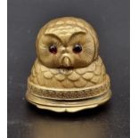 An Antique Russian Silver Gilt Owl's Head Portrait Snuff Box. Rich gilding throughout, red