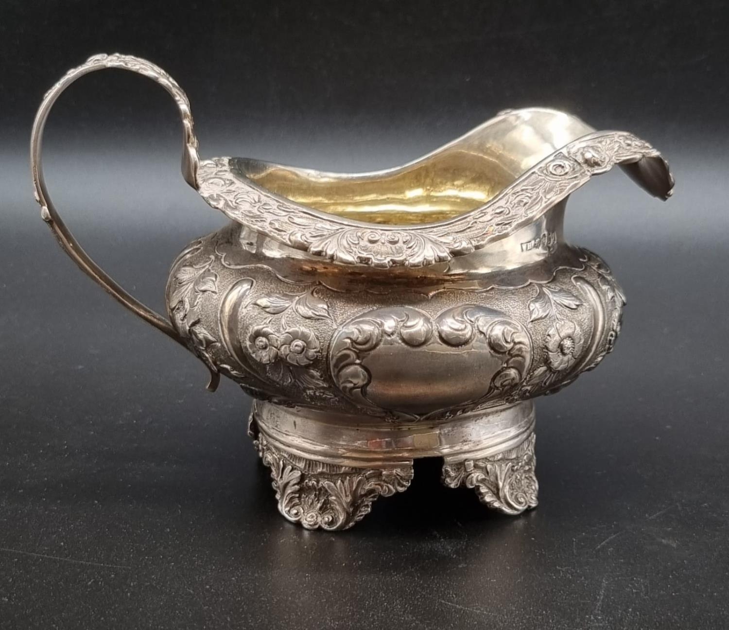 An Antique 19th Century Georgian Silver Judge Bowl. Embossed floral decoration throughout. Hallmarks