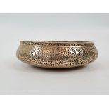 An Antique Islamic Brass Bowl with Islamic Calligraphy - Verses of the Koran. 18cm diameter.