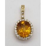 Large citrine pendant with 0.54ct diamonds set in 18k yellow gold, weight 4.3g and 3cm drop approx