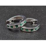 A Pair of 18K White Gold Diamond and Emerald Mini Hoop Earrings. 4.4g