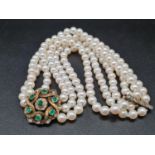 A Three-Row Akoya Pearl Collar with an 18K yellow Gold Diamond and Emerald Pendant - With a